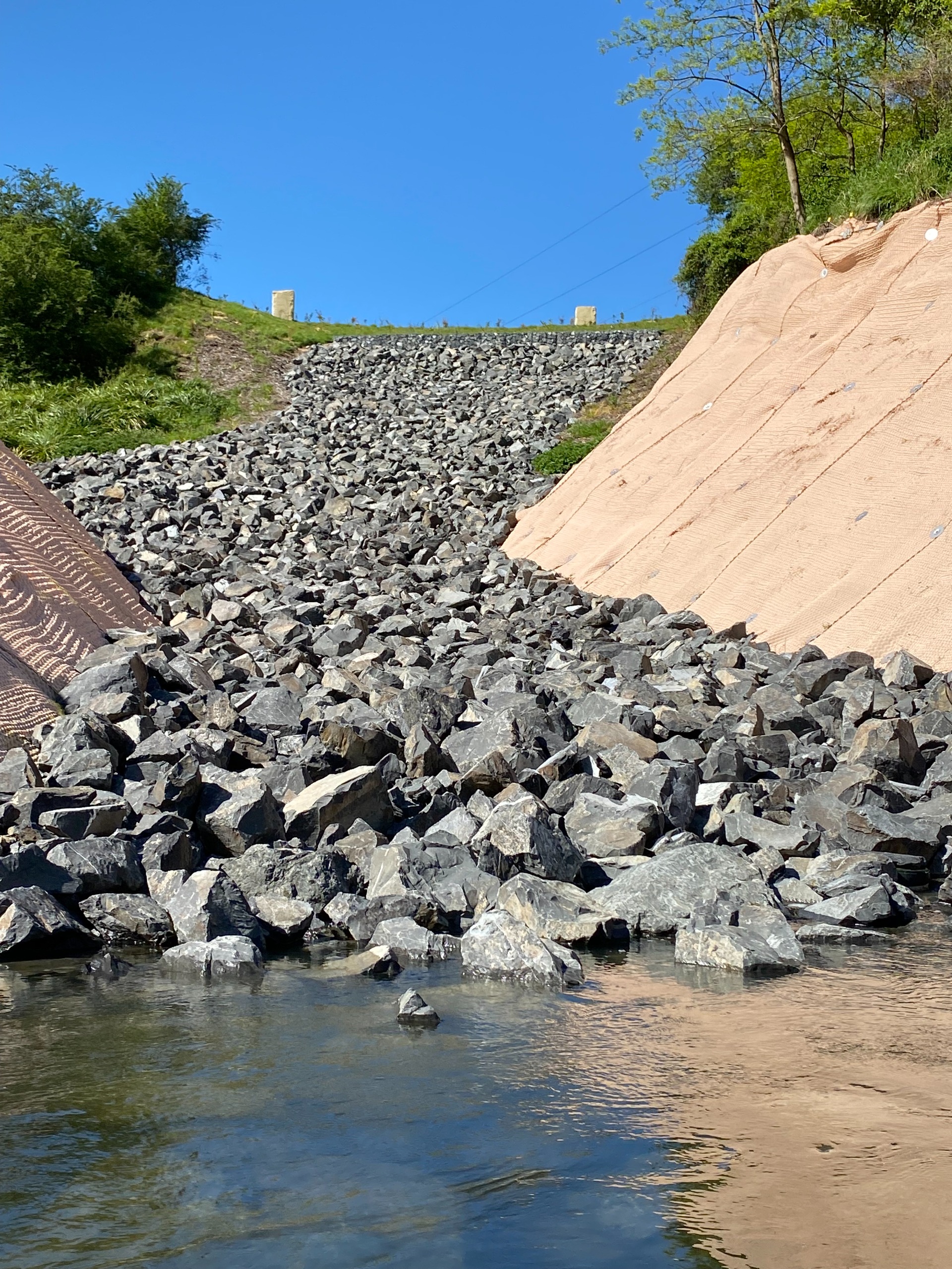 A structure built of rocks taken from the edge of the Waikato River looking up the structure
